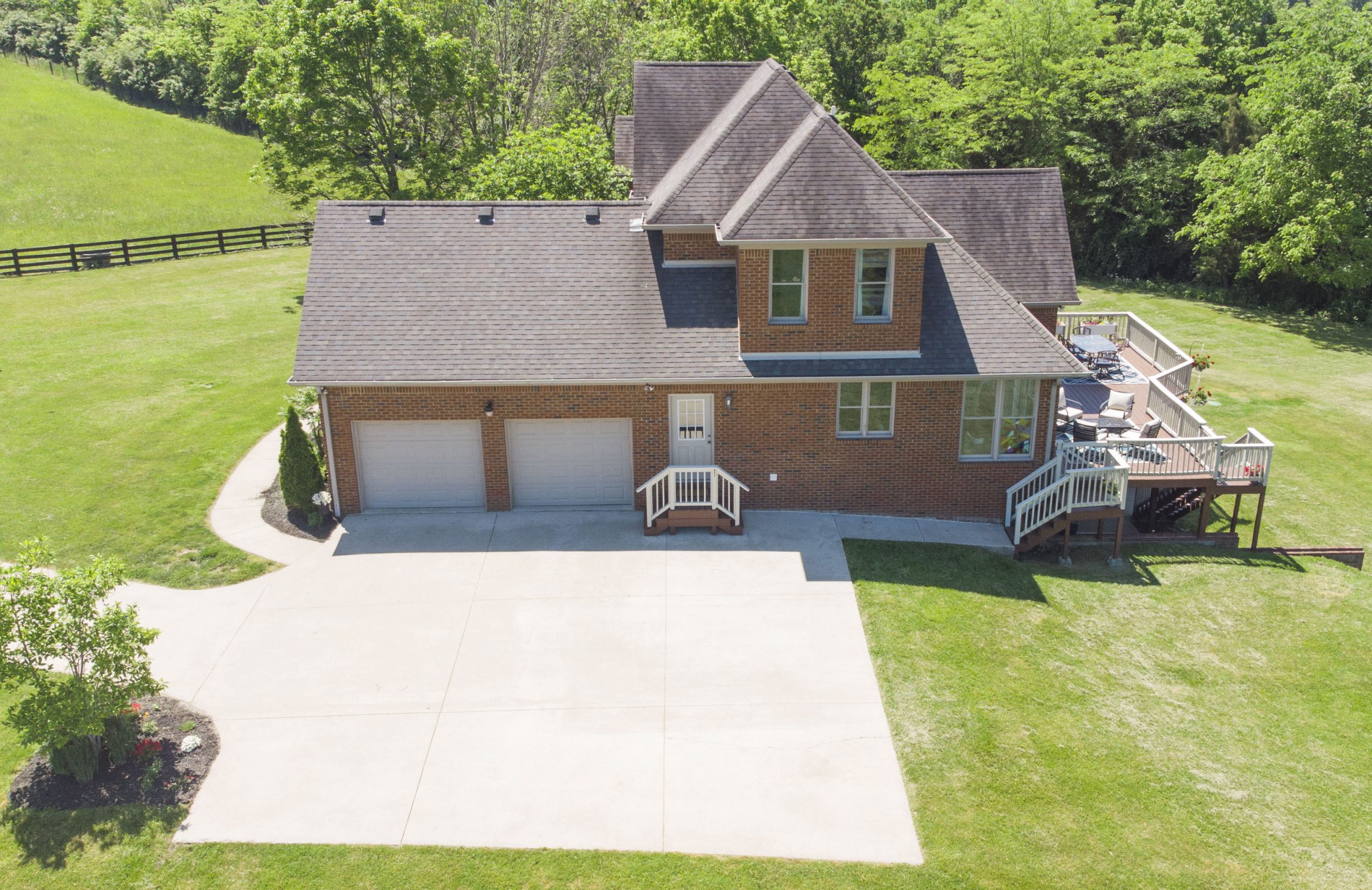 aerial photo showing driveway of house